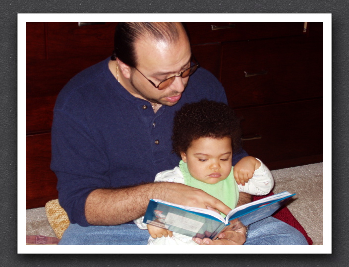 Daddy reads Kayla's favorite book