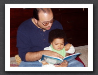 Daddy reads Kayla's favorite book