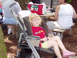 Cousin Rachel chills out in Kayla's stroller