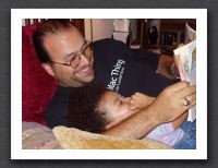 Daddy reads to Kayla #2