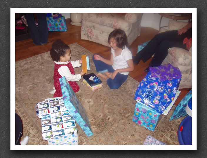 Kayla and Gabrielle open presents