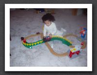 Kayla loves her trains from Nanna and Papa