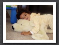 Kayla loves her polar bear rug
