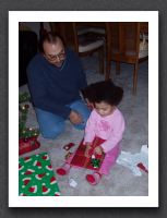 Kayla and Daddy open presents