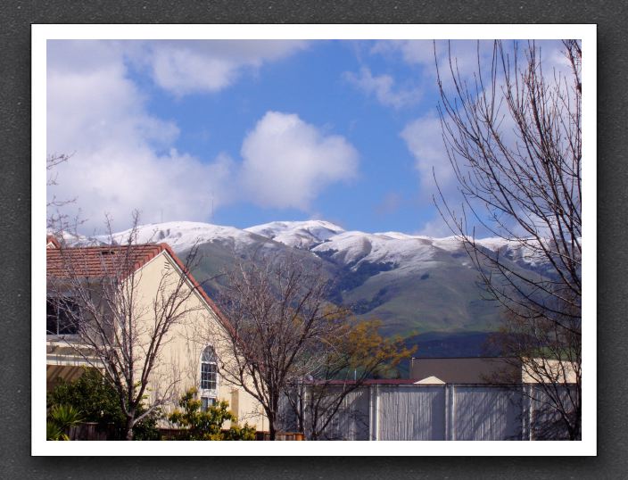Snow on the mountaintops in Milpitas (a rare sight)