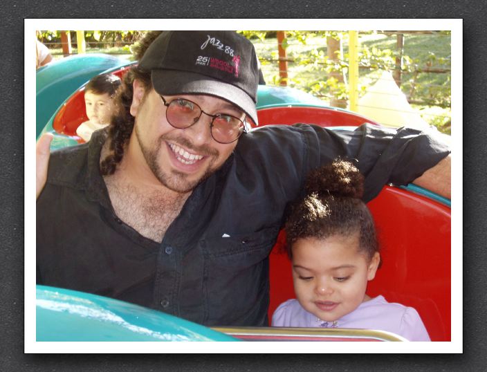 Kayla and Daddy on the Worm Ride