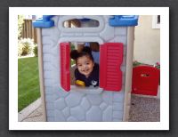 Kayla in her playhouse