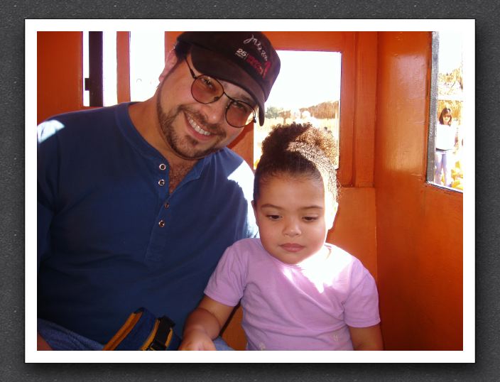 Daddy and Kayla on the pumpkin train
