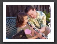 Uncle Robbie gives Gabby a funny clarinet lesson